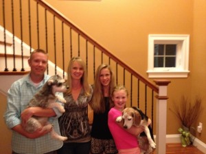 This is me with my host family. From left to right: Scott, Rebecca, Me, Emma. Scott is holding their dog Zoe, and Emma is holding Buddy.